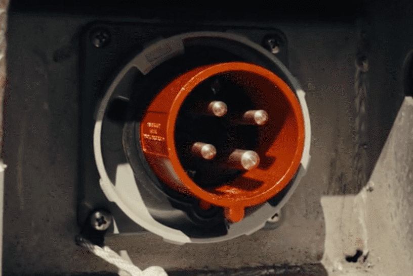 Rear shore power receptacle